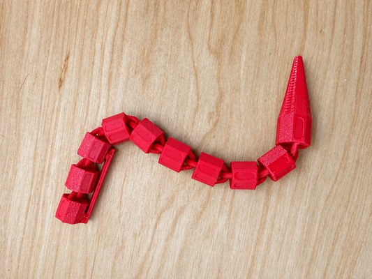3D Printed Articulated “Ouchie” Fidget Toy – Red