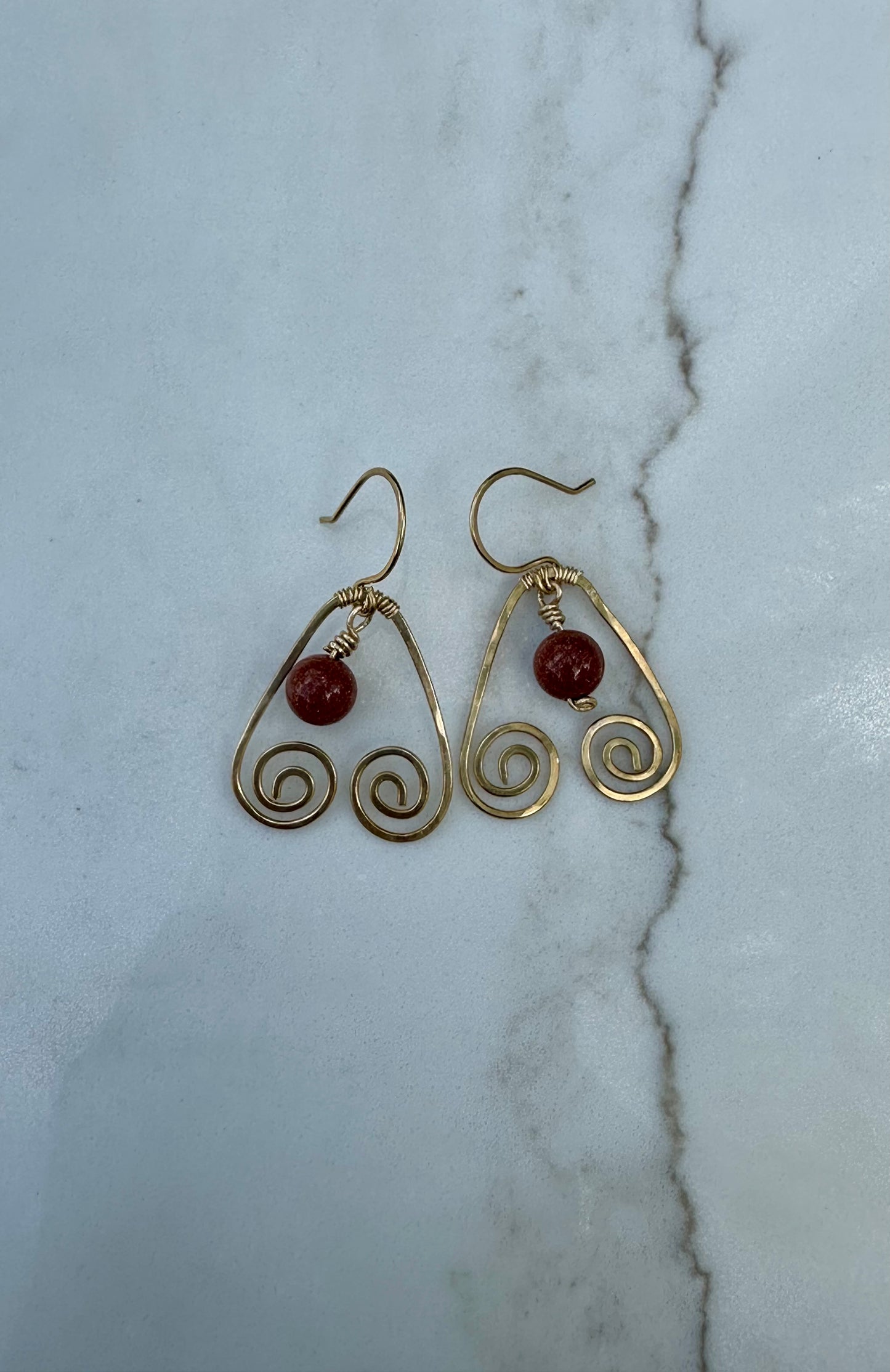 Brass teardrop swirl earrings