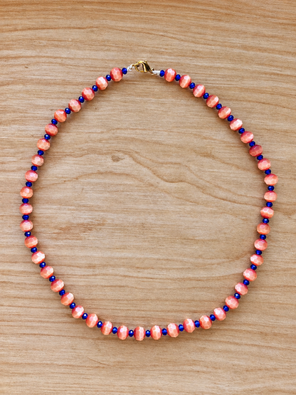 Handmade Coral Orange Beaded Necklace with Royal Blue Accents