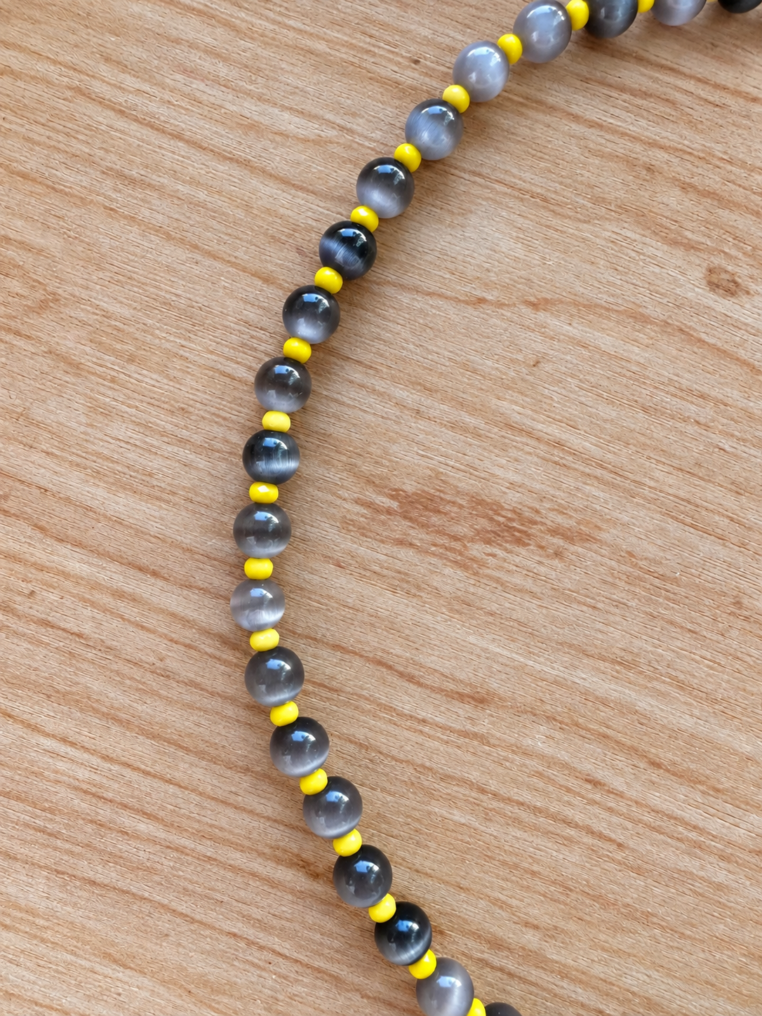 Handmade Gray Cat’s Eye Beaded Necklace with Yellow Accents