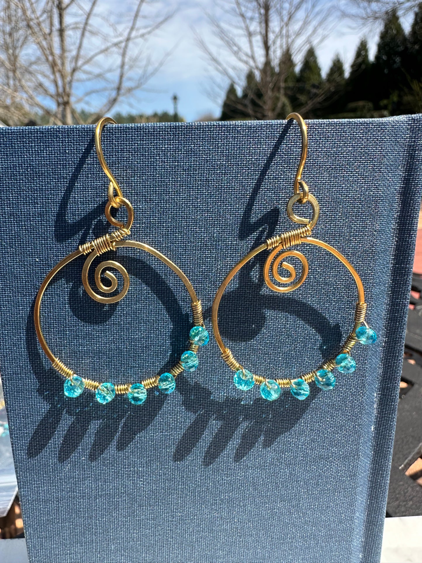 Brass + blue crystal circle earrings