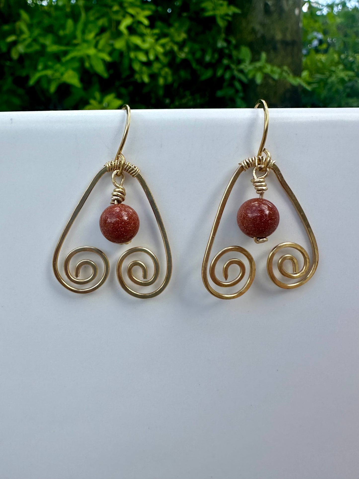 Brass teardrop swirl earrings